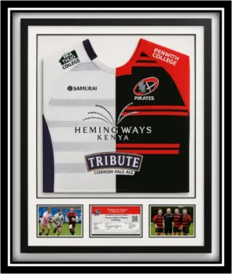 Two rugby shirts are professionally framed together in a single display frame and made to look like one shirt.